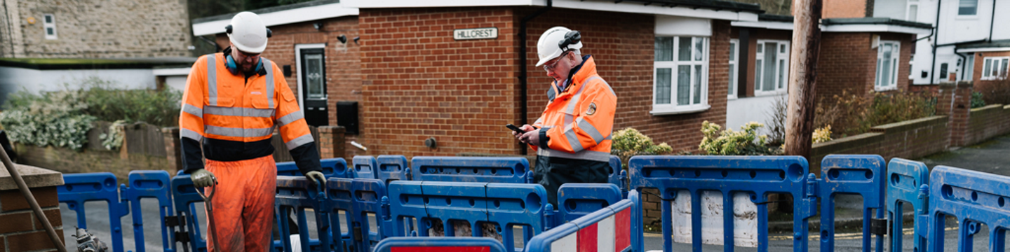 Two Essex & Suffolk water employees working